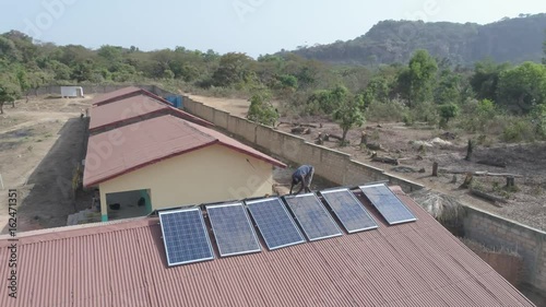 Wallpaper Mural drone view over solar array - aerial over the dry landscape of Guinea, West Africa Torontodigital.ca