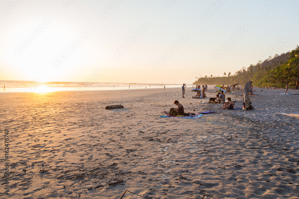 Surfers at Sunset in Santa Teresa, Costa Rica