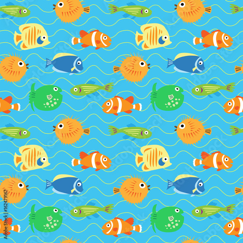 Seamless decorative background from multi-colored tropical fish