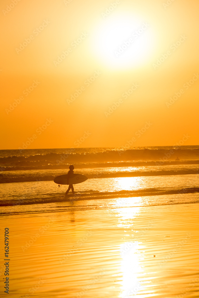 Surfers at Sunset in Santa Teresa, Costa Rica