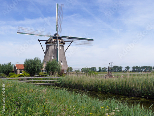Windmill on the Rotte river in Zuidplaspolder photo