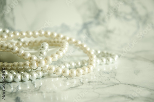 natural pearls on marble table