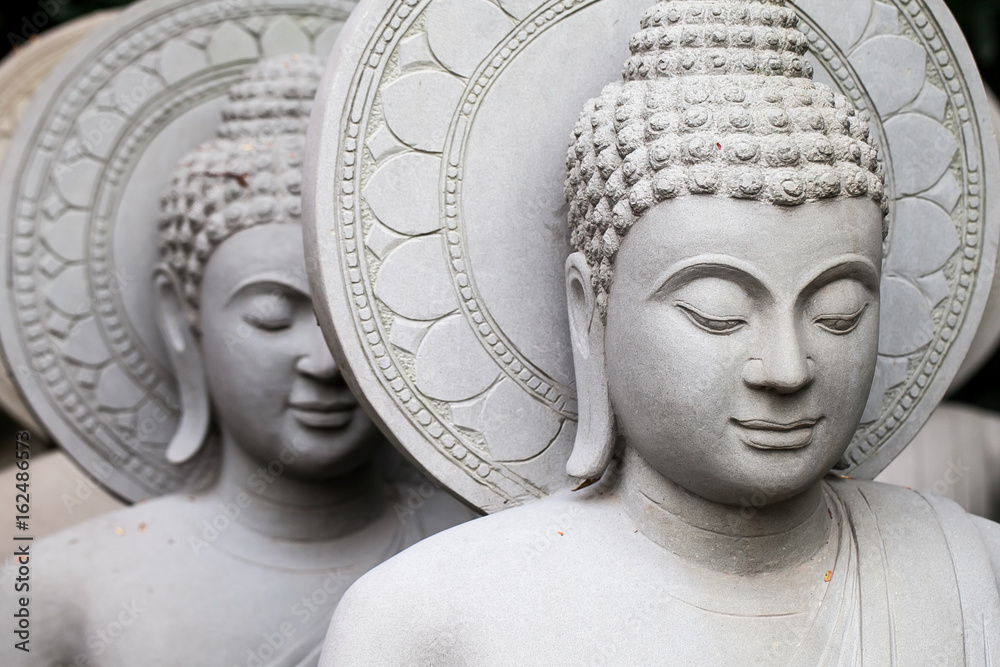 close up of stone Buddha statue