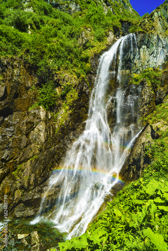 Fototapeta Naklejka Na Ścianę i Meble -  Beautiful waterfall in the mountains of Fagaras Romania