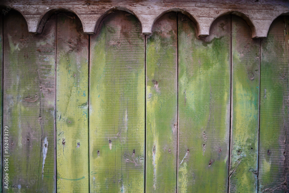 Fototapeta premium Green wooden old plank texture as background. Closeup