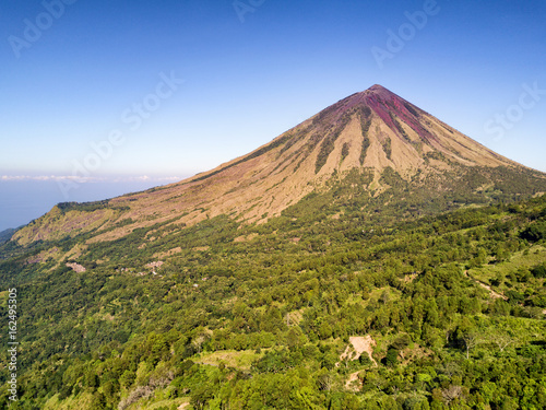 Aerial view of mount Inerie with the Bena traditional village at the foot of the mountain near Bajawa, Indonesia. photo