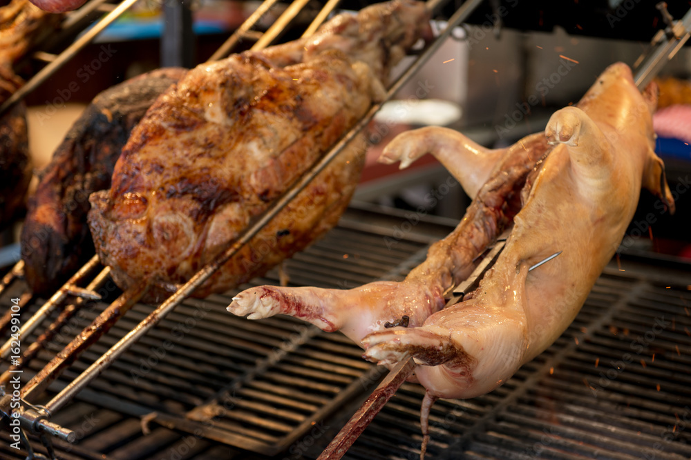 Street food in San Fermin feast, Pamlona, Navarra, Spain. Pork. Grilled