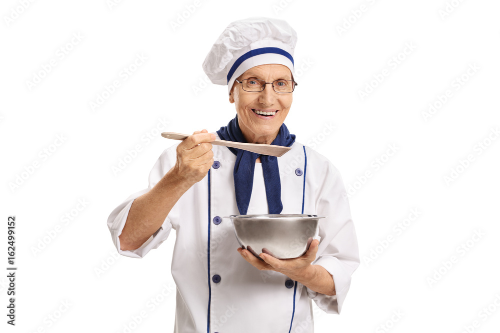 Chef holding a pot and a spoon Chef holding a pot and a spoon