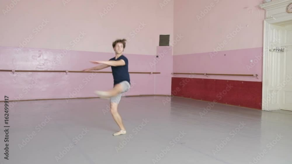Dancing man modern ballet dancer performs dance in studio 60 fps slow motion Dancing man modern ballet dancer performs dance in studio 60 fps slow motion