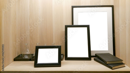Blank picture frame template set for Photo or picture painting art gallery in interior Placed on the table.