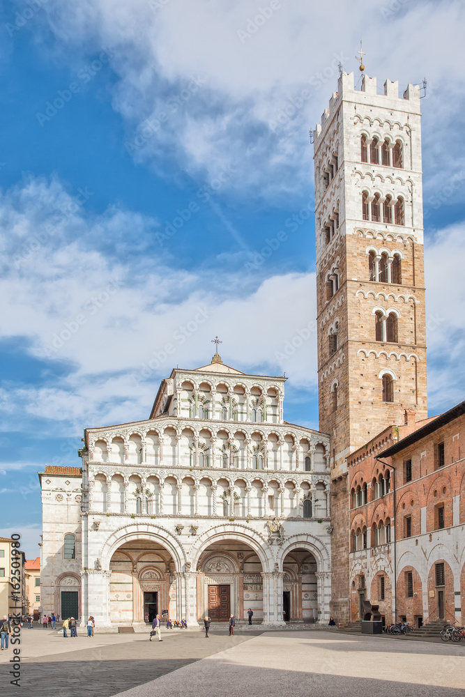 Facade and bell tower of Lucca Cathedral, Italy
