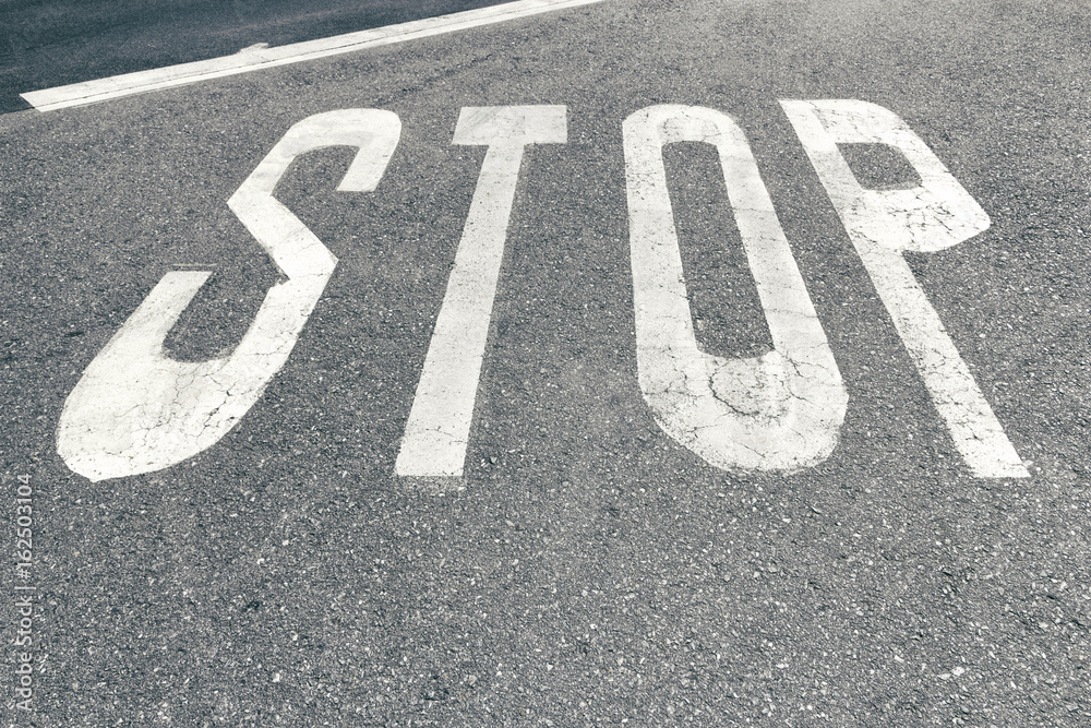 Stop word on asphalt Stop word on asphalt