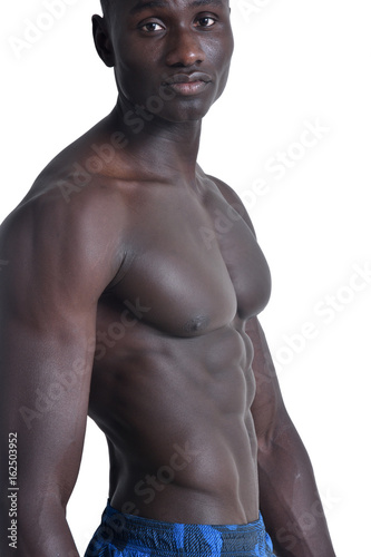 portrait of a muscular african man on white