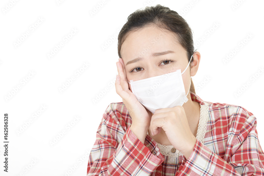 風邪に罹患した女性
