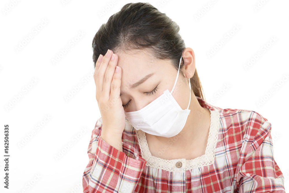 風邪に罹患した女性