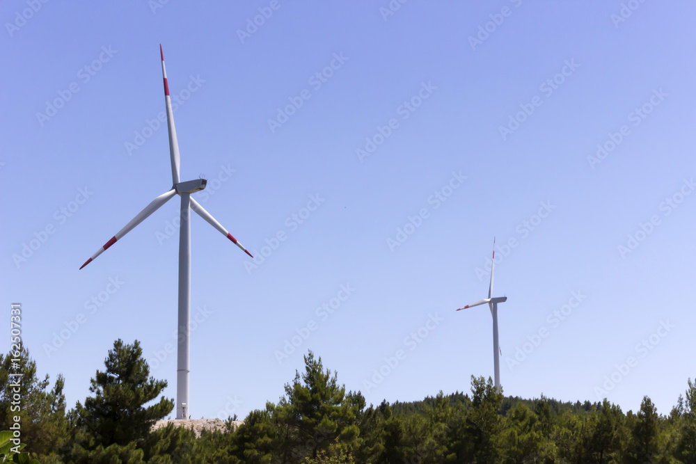 Wind turbines generating renewable wind energy Wind turbines generating renewable wind energy