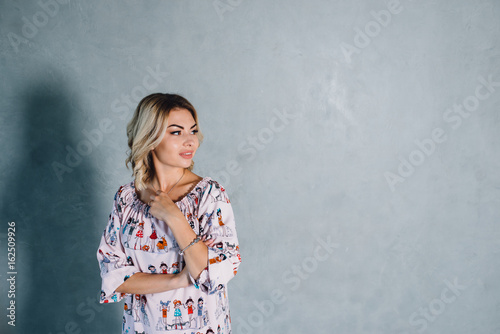Emotion Girl with Sensual Lips on Grey Background photo