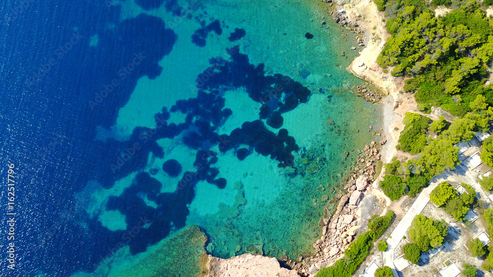 Aerial drone photo of Hamolia area with turquoise colored clear water rocky beaches, Porto Rafti, Mesogeia, Attica, Greece