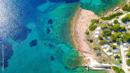 Fototapeta Naklejka Na Ścianę i Meble -  Aerial drone photo of Hamolia area with turquoise colored clear water rocky beaches, Porto Rafti, Mesogeia, Attica, Greece