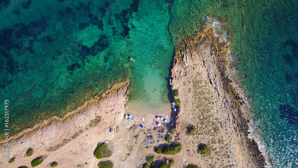 Aerial drone photo of Hamolia area with turquoise colored clear water rocky beaches, Porto Rafti, Mesogeia, Attica, Greece Aerial drone photo of Hamolia area with turquoise colored clear water rocky beaches, Porto Rafti, Mesogeia, Attica, Greece