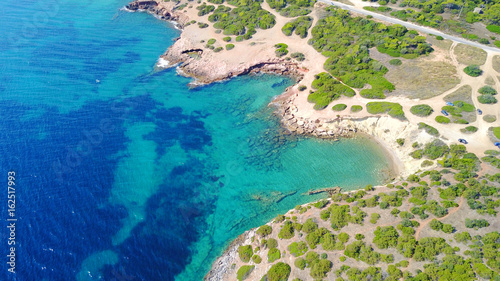 Aerial drone photo of Hamolia area with turquoise colored clear water rocky beaches, Porto Rafti, Mesogeia, Attica, Greece photo