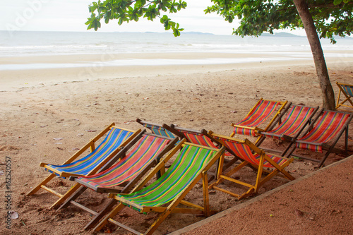 Plastic chairs on the beach