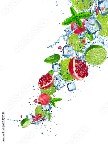 Fresh fruits in water splash on white background