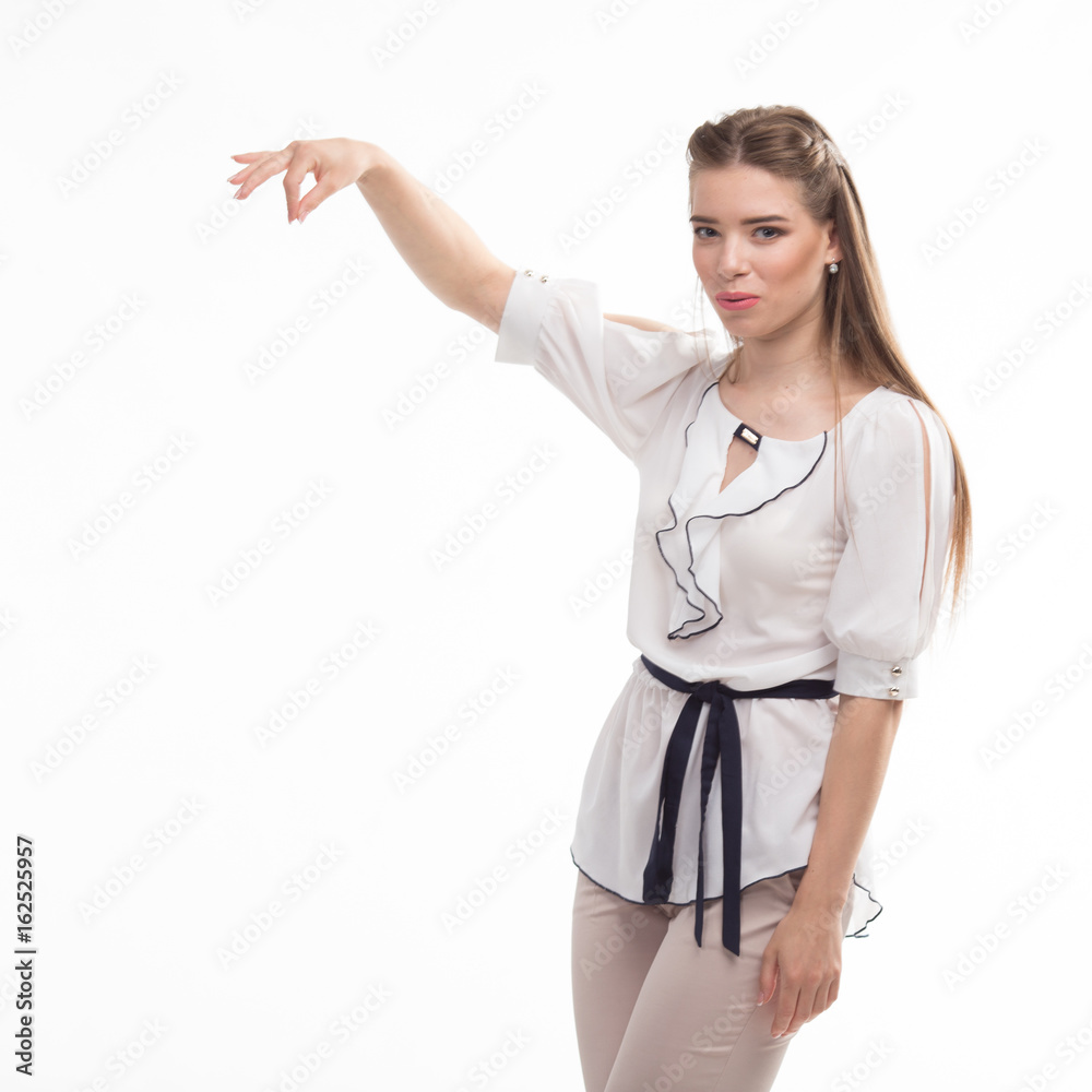 Young sexy woman showing presentation by hands on a gray background. Ideal for banners, registration forms, presentation, landings, presenting concept.. Young sexy woman showing presentation by hands on a gray background. Ideal for banners, registration forms, presentation, landings, presenting concept..