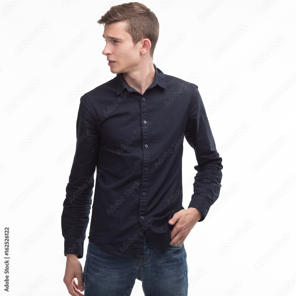 Young sexy man portrait of a confident businessman on a gray background. Ideal for banners, registration forms, presentation, landings, presenting concept. Young sexy man portrait of a confident businessman on a gray background. Ideal for banners, registration forms, presentation, landings, presenting concept.