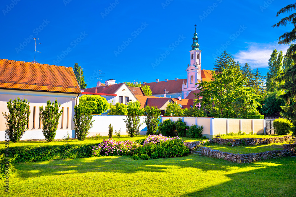Colorful street and green park in baroque town Varazdin