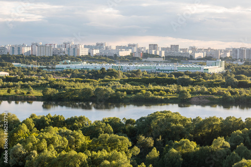 MOSCOW, RUSSIA - June, 2017: Kapotnya, Moskva Reka, Maryno and Brateevo, outskirts of UVAO Moscow, Russia. Summer view of city, park and Moscow River. Evening
