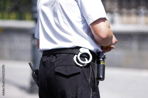 Policeman with handcuffs