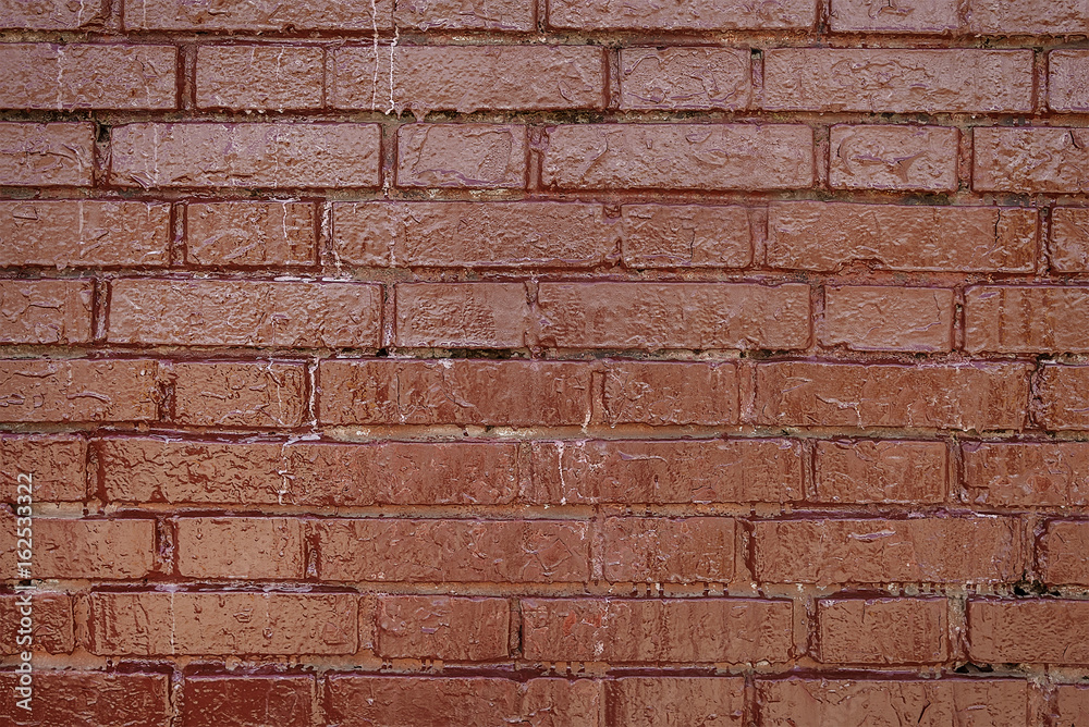 Obraz premium Old dark red painted brick wall background texture