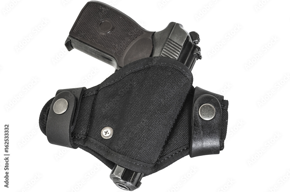 Handgun in the nylon holster. Isolated Handgun in the nylon holster. Isolated