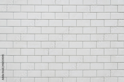 Old white tile brick wall background texture
