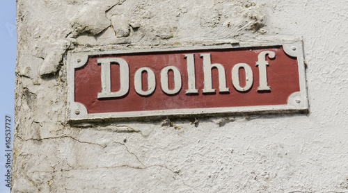 Old street sign Doolhof in Volendam