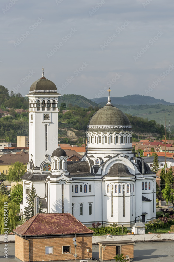 Beautiful vertical view of the famous Holy Trinity Church, Sighisoara, Romania