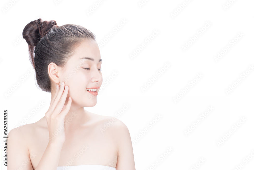 Woman Touching her Face. Facial treatment . Cosmetology , beauty and spa . Pure Beauty Model. Youth and Skin Care Concept.while isolated on white background Woman Touching her Face. Facial treatment . Cosmetology , beauty and spa . Pure Beauty Model. Youth and Skin Care Concept.while isolated on white background