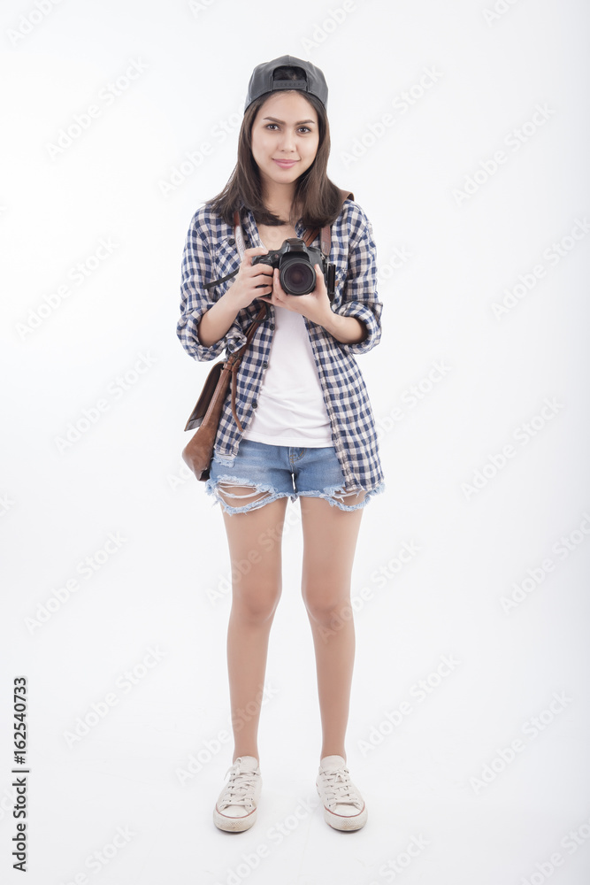 Beautiful travel girl with camera isolated on white background