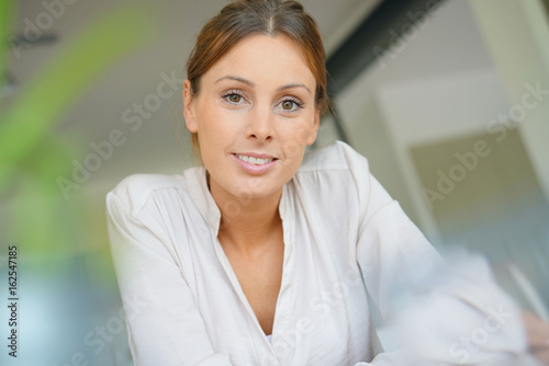 Portrait of attractive woman looking at camera