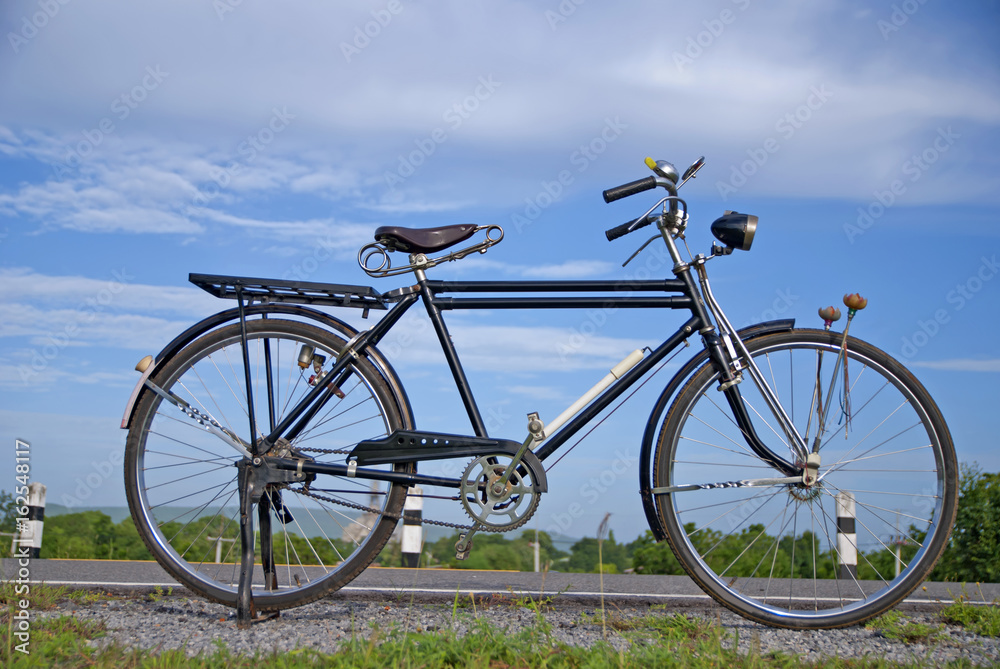 Old bike in Thailand, old bike in dam Old bike in Thailand, old bike in dam