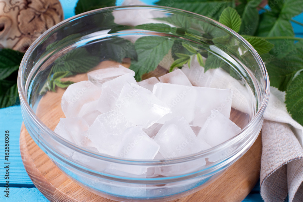 Ice cubes in a glass bowl