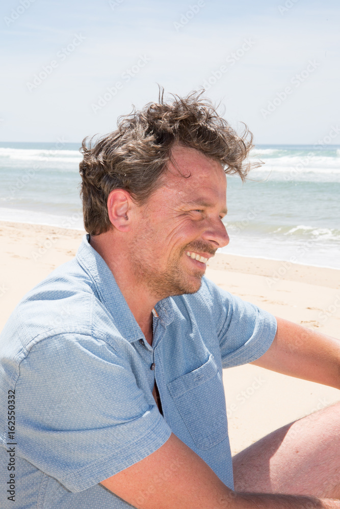 A very charming portrait of a middle-aged man at the seaside during these holidays A very charming portrait of a middle-aged man at the seaside during these holidays