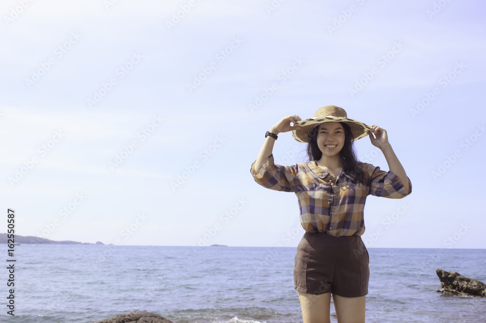 Beautiful girl in vacation time at sea. Soft light, Soft focus. Pastel or Vintage style.