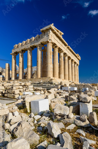 Parthenon temple on a bright day. Acropolis in Athens, a popular tourist destination and historical landmark in Greece. 