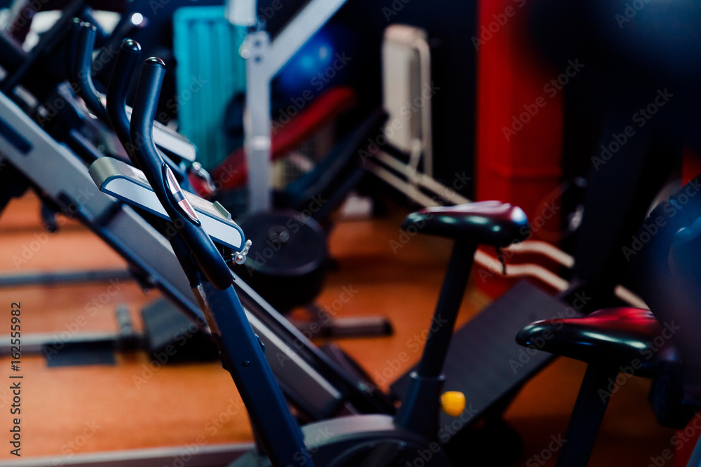Bicycle simulator, sports equipment in the gym. Bicycle simulator, sports equipment in the gym.