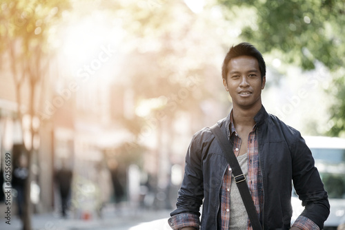 Photography Handsome guy walking in the streets of Greenwich village