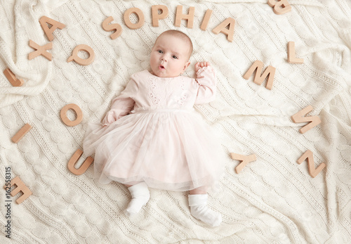 Cute baby with word SOPHIA ...