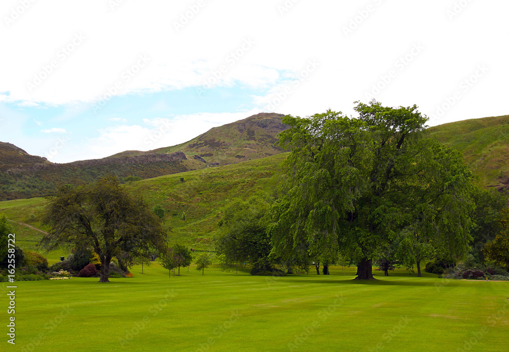 Famous hills of Holyrood Park and the Arthur's seat. View from Holyrood Palace. Edinburgh, Scotland, June.