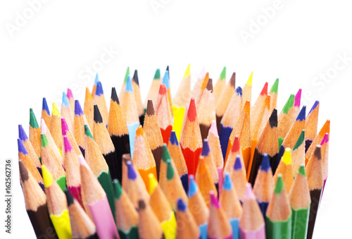 Colored pencils close-up isolated on white background